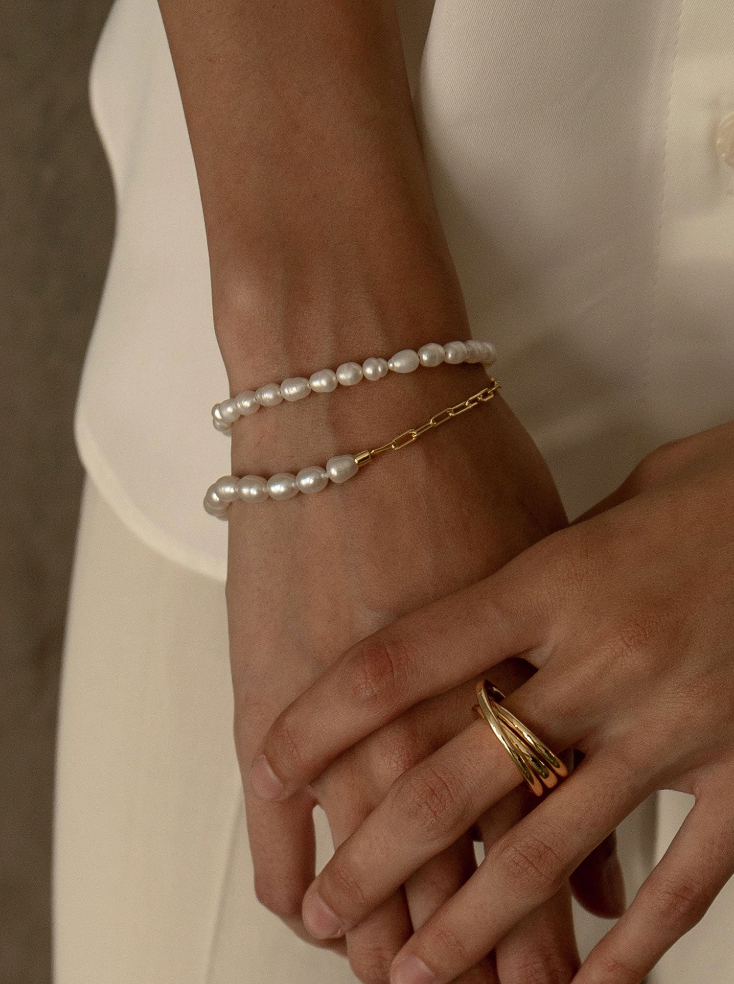 Pulseras con perlas en plata diseño paperclip