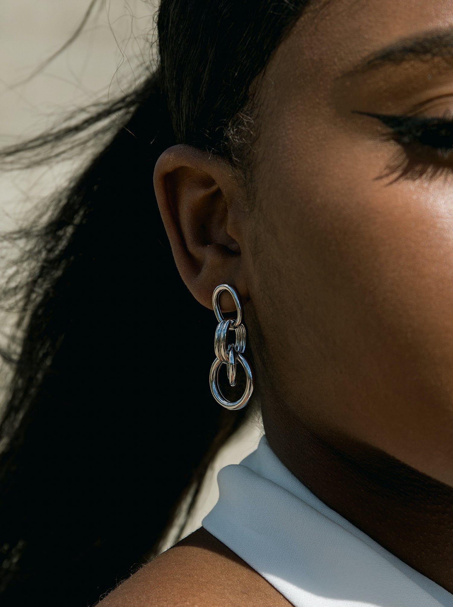 Long silver earrings, modern design with links