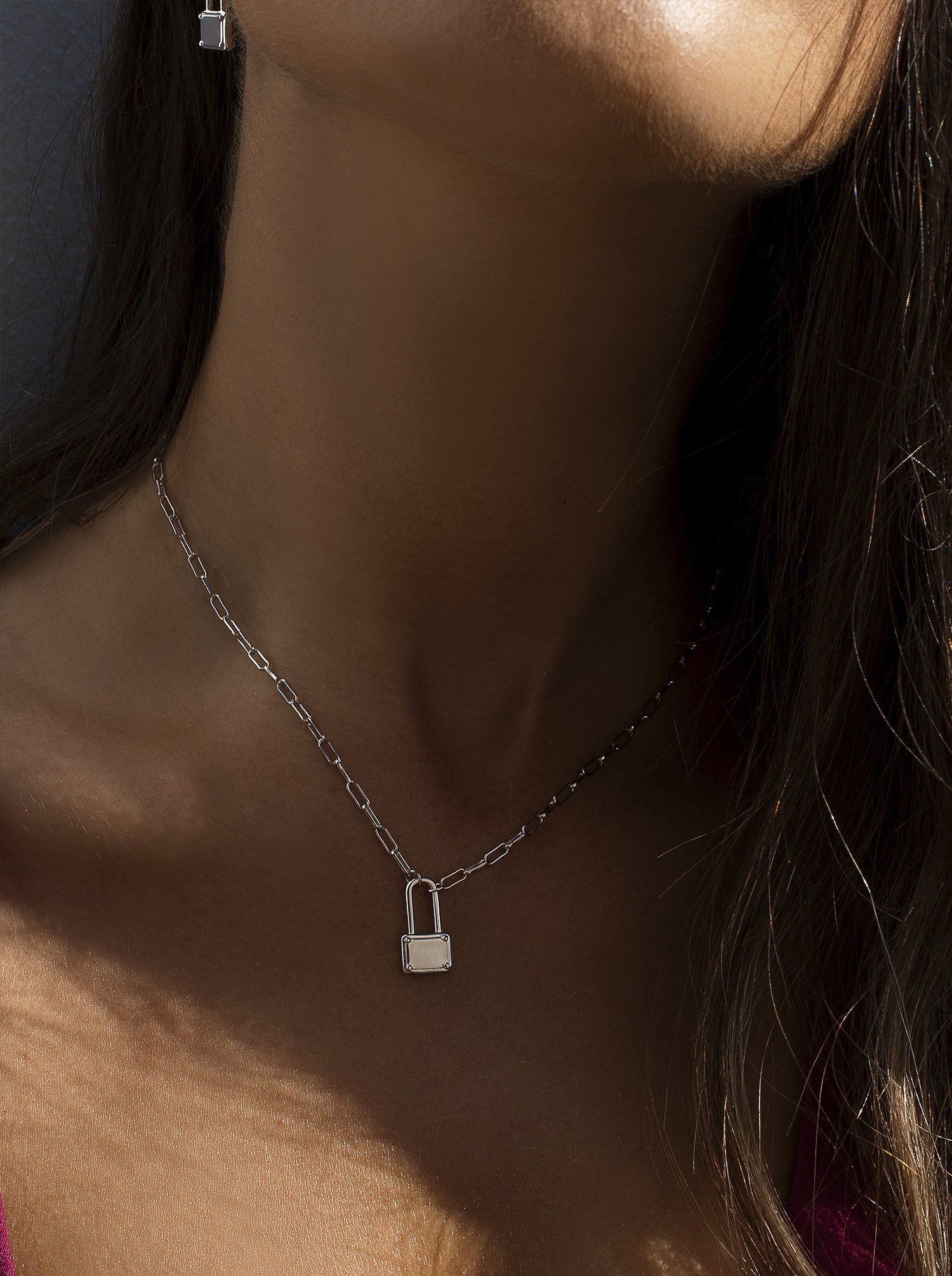 Silver chain necklace with padlock design