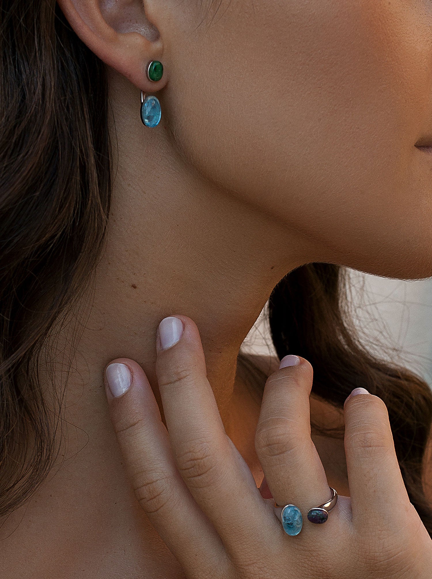 Silver earrings with green and blue cabochon stones