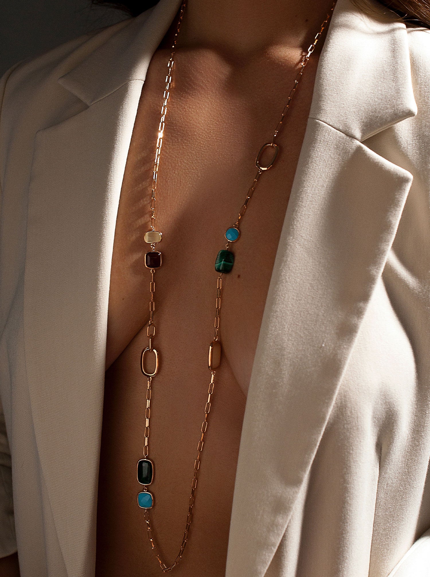 Long necklaces with designer stones in autumn tones