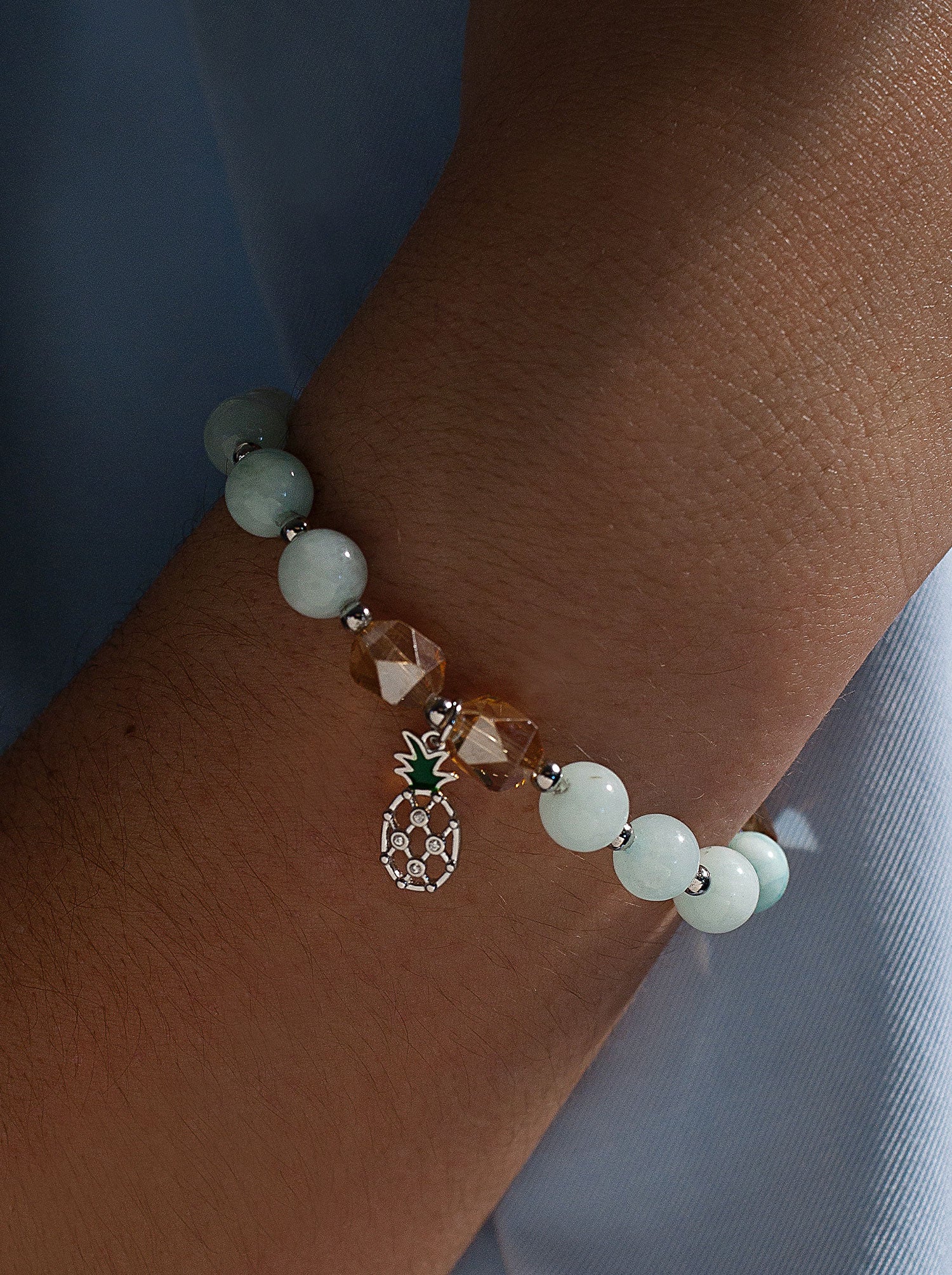 Silver bead bracelets with pineapple charm and semi-precious stones