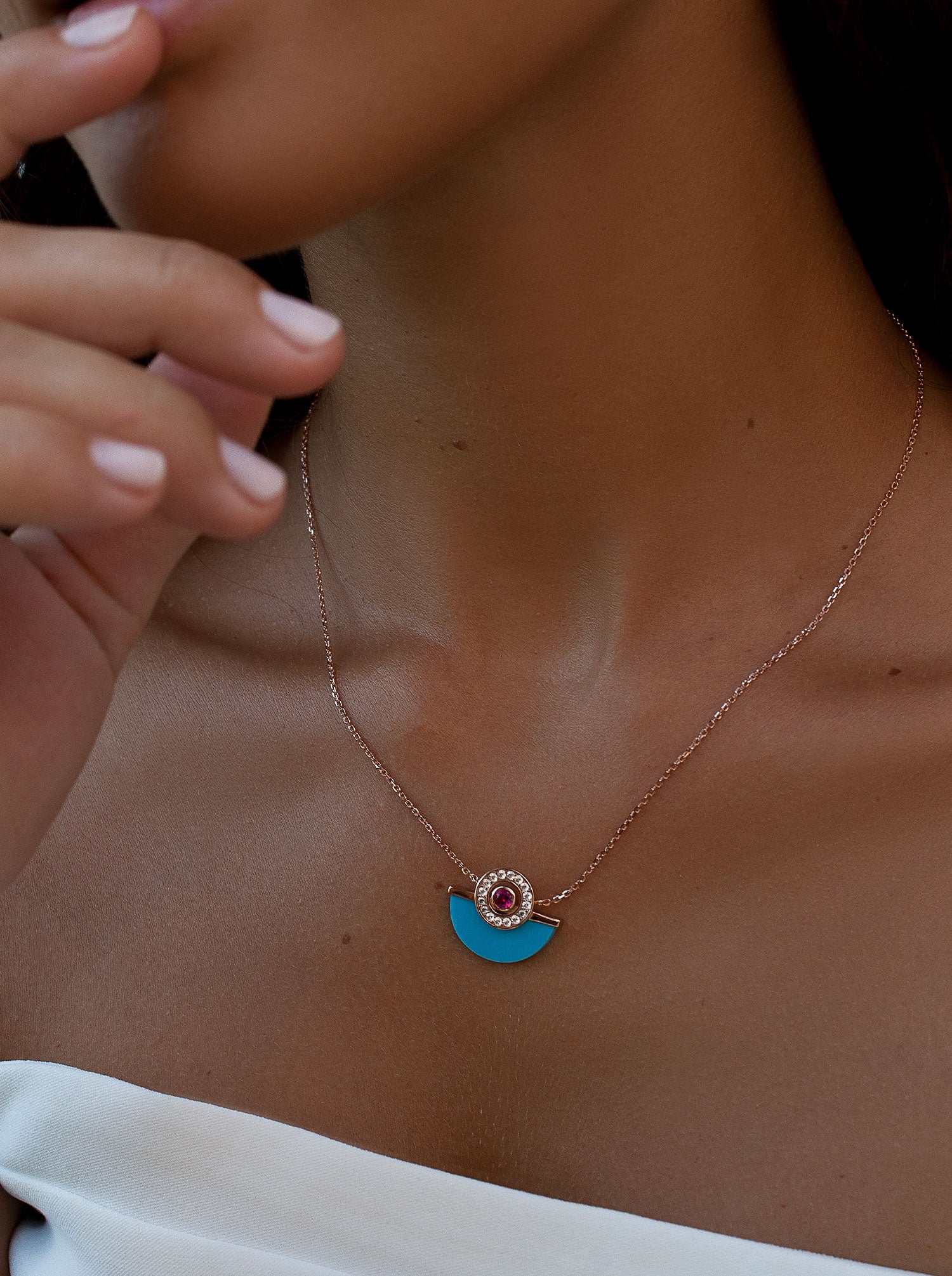 Rose gold-tone turquoise half moon pendant necklace with cubic zirconia