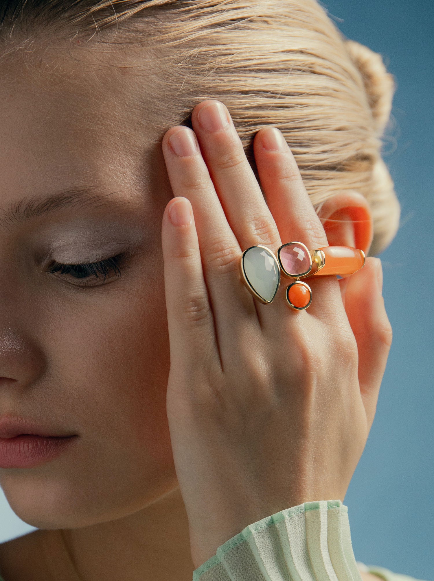 Rings with rose quartz teardrop design stones