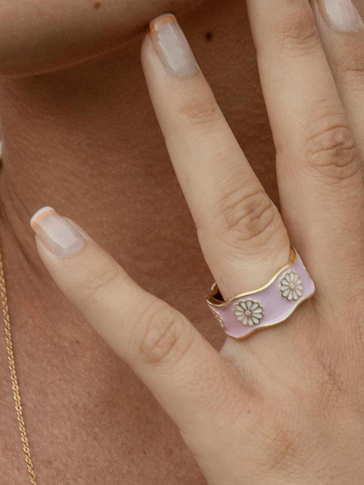 Silver enamel rings with a purple hippie design