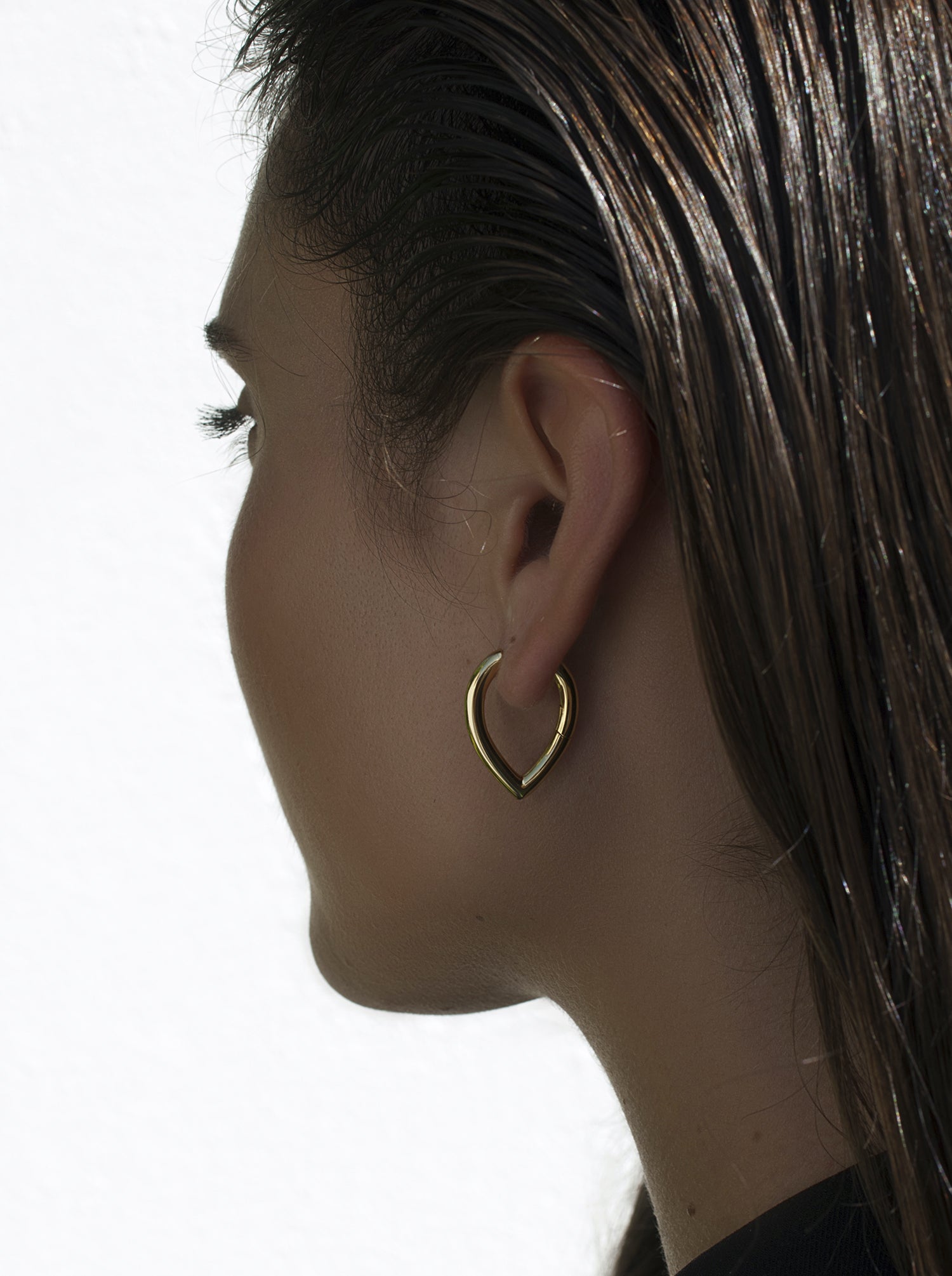 Gold-plated silver hoop earrings with oval point design