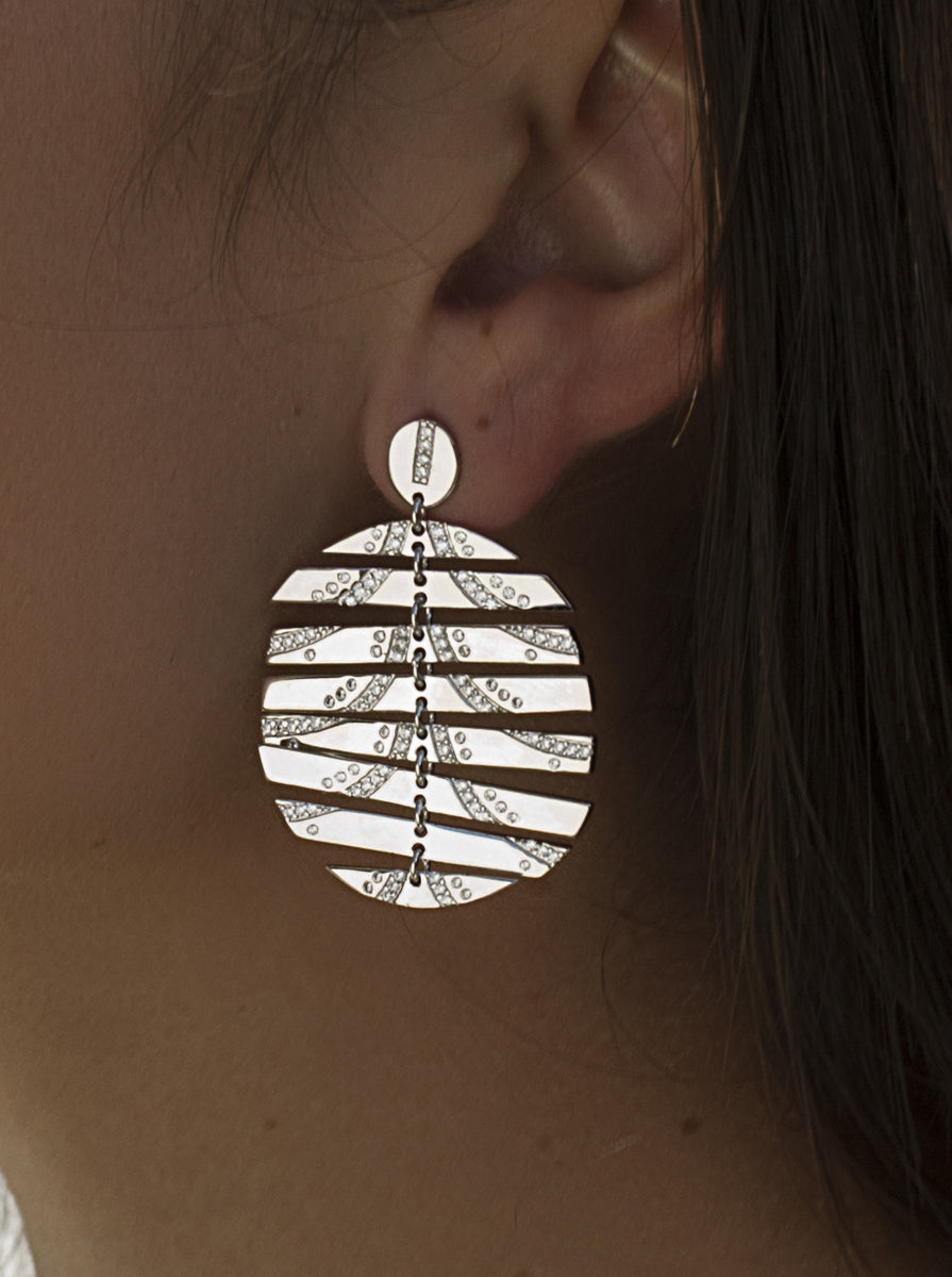 Pendientes circulares con diseño circular movible con circonitas