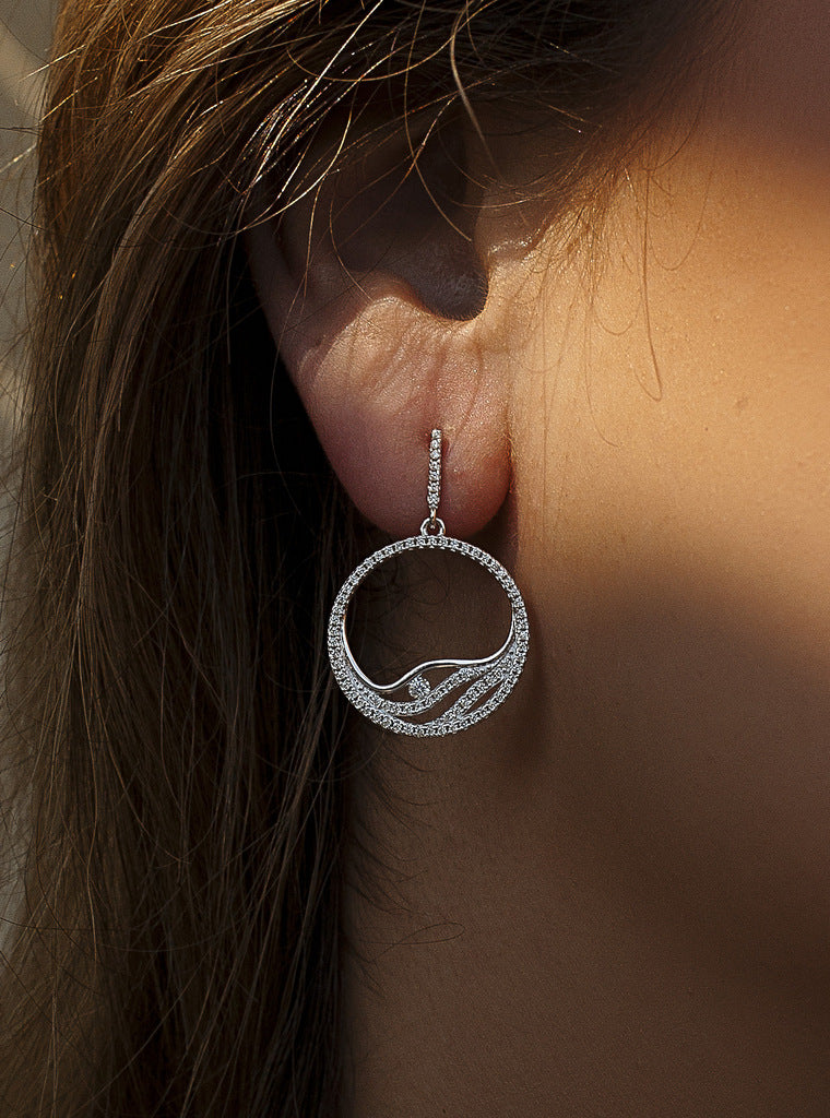 Pendientes colgantes de plata diseño circular con circonitas ondas interior