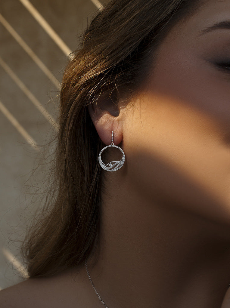 Pendientes colgantes de plata diseño circular con circonitas ondas interior