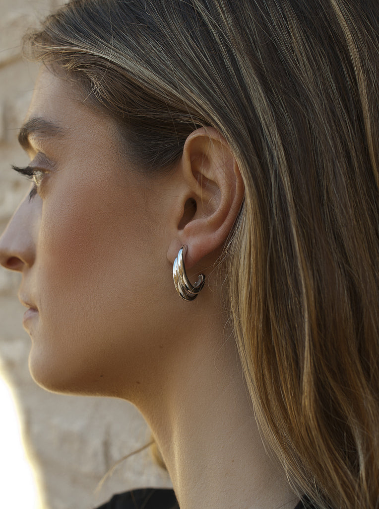 Pendientes de aro doble en tono plateado