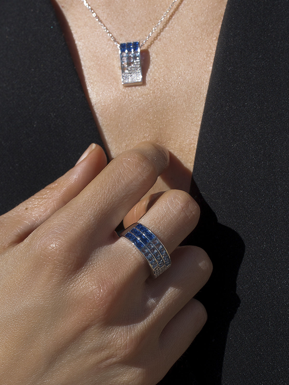 Rings with triple rail stones in shades of blue
