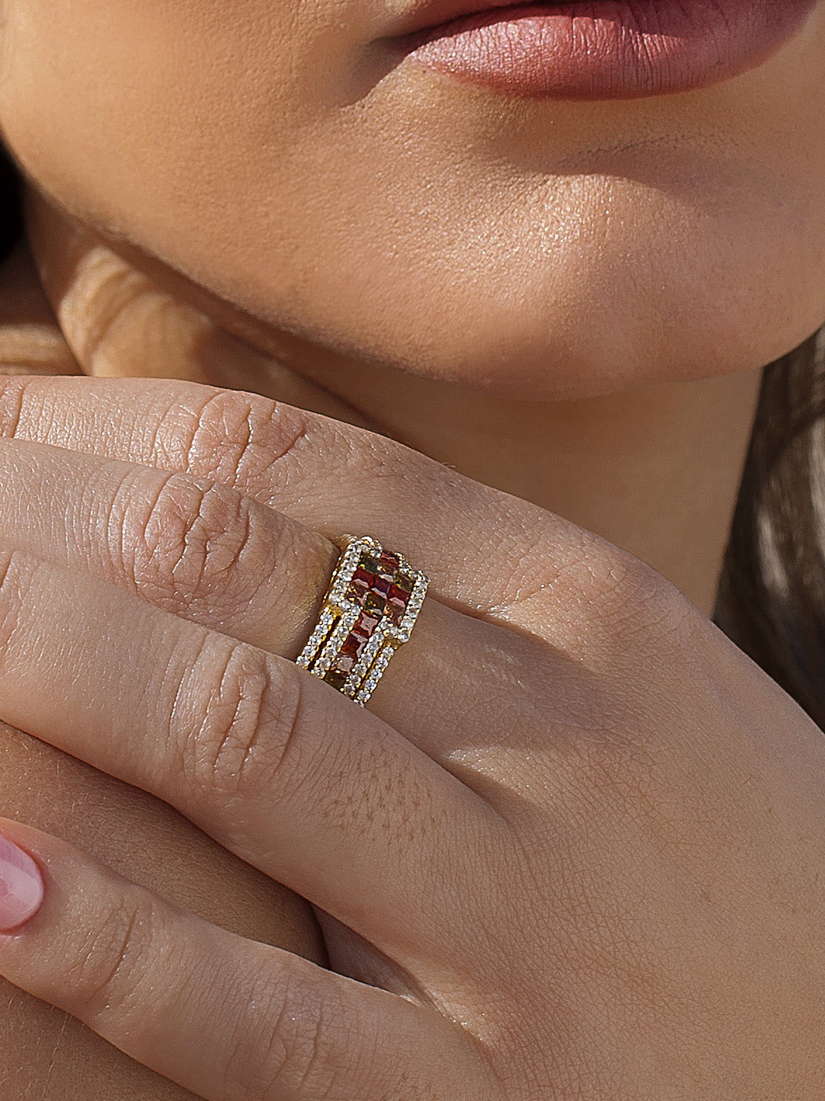 Ring with stones in warm orange tones