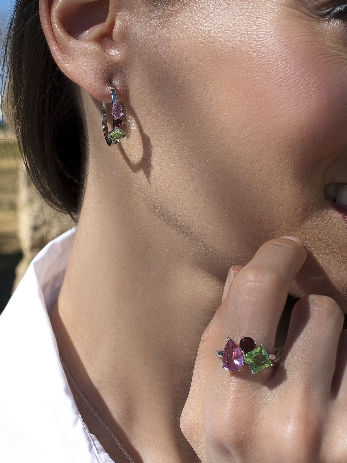 Rings with central motif stones in shades of yellow and garnet