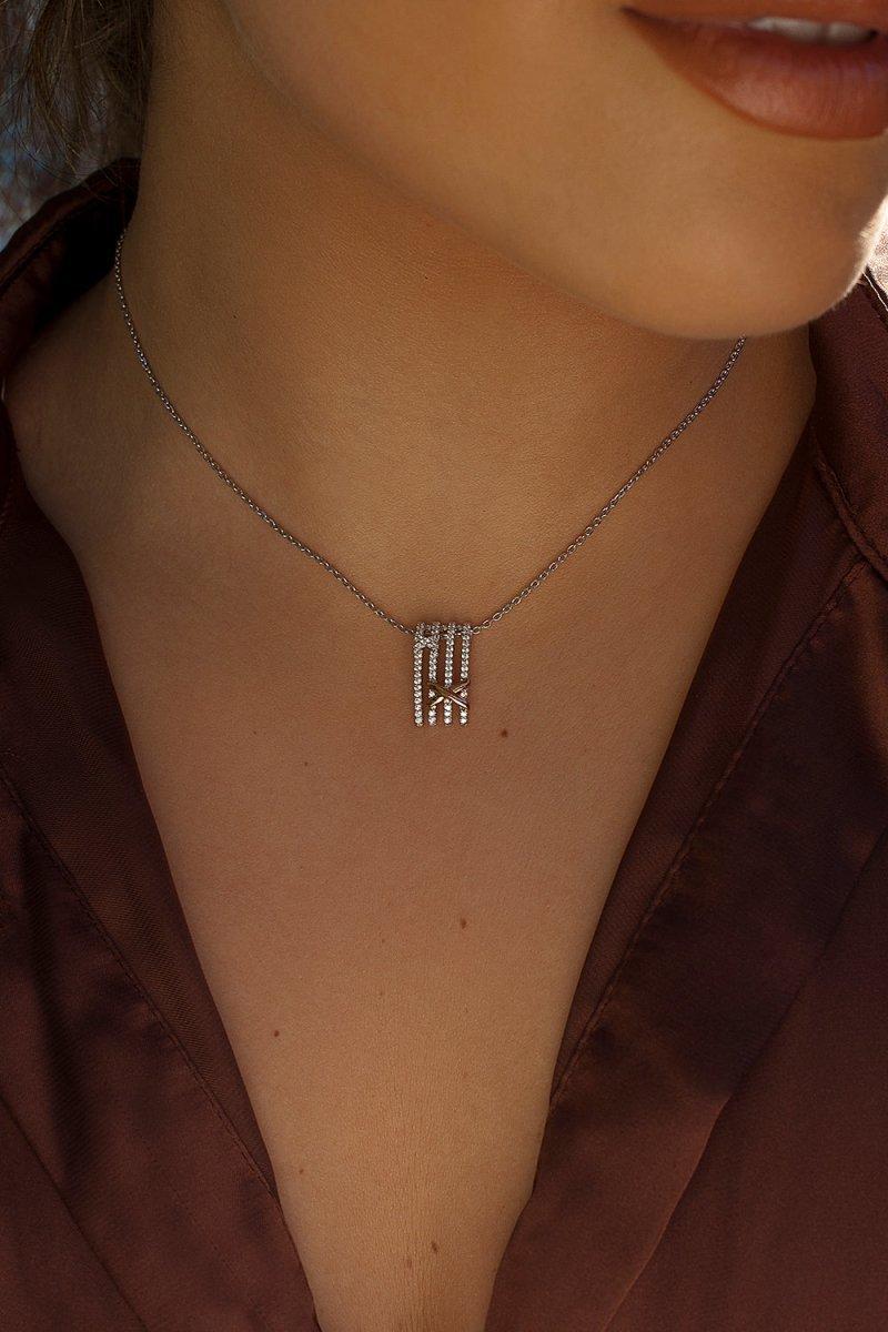 Colgantes bicolor plata grapa cruzada y circonita-LINEARGENT