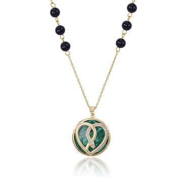 Collar medalla motivo central en forma de corazón y serpiente con circonitas