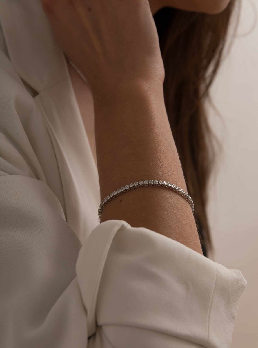 Pulsera riviere de plata motivo circular de circonita blanca