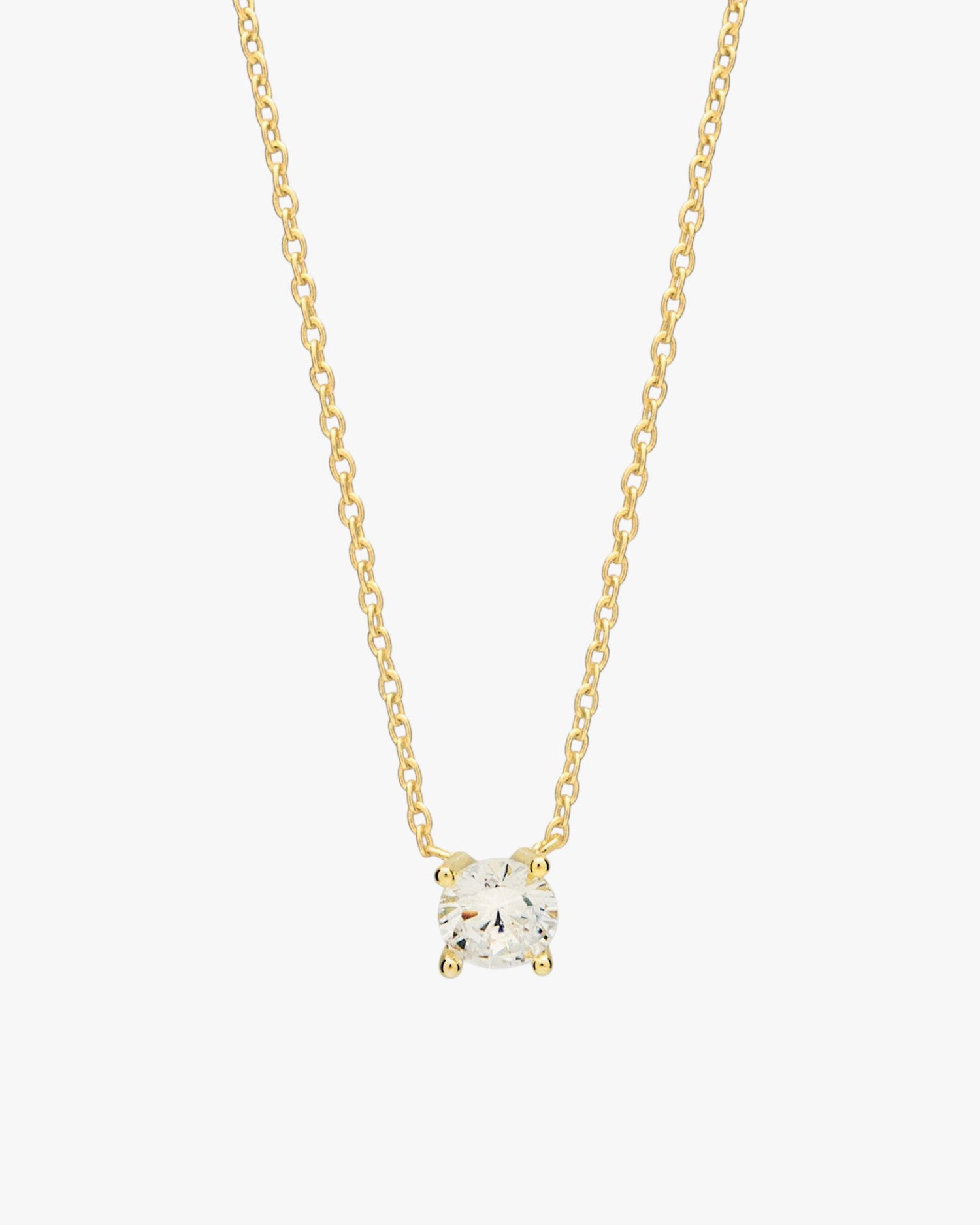 Small pendants with cubic zirconia plated in gold