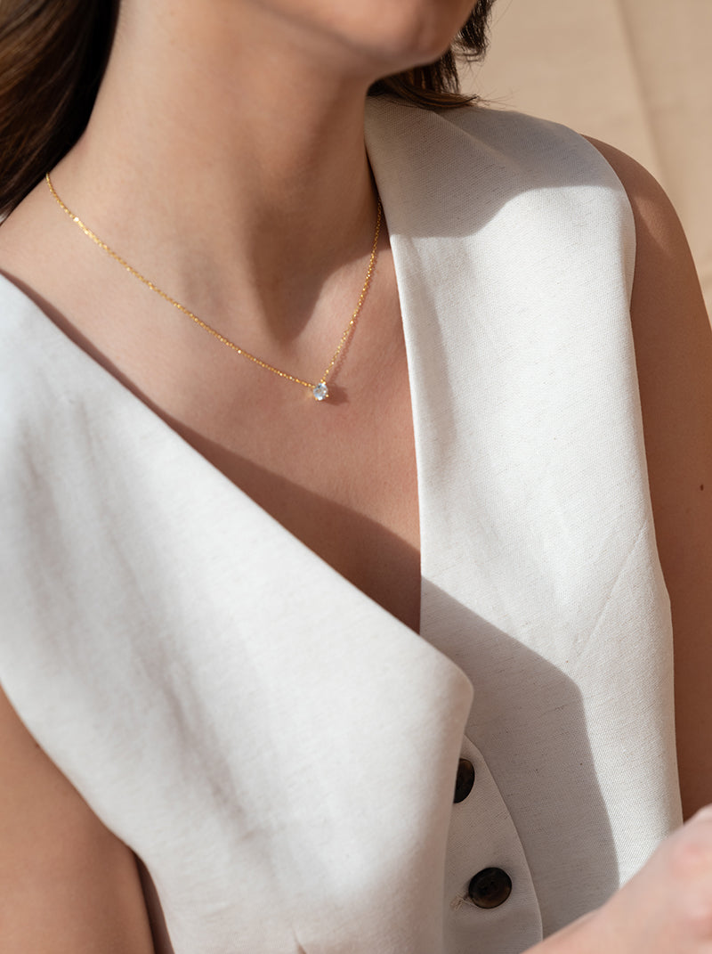 Small pendants with cubic zirconia plated in gold