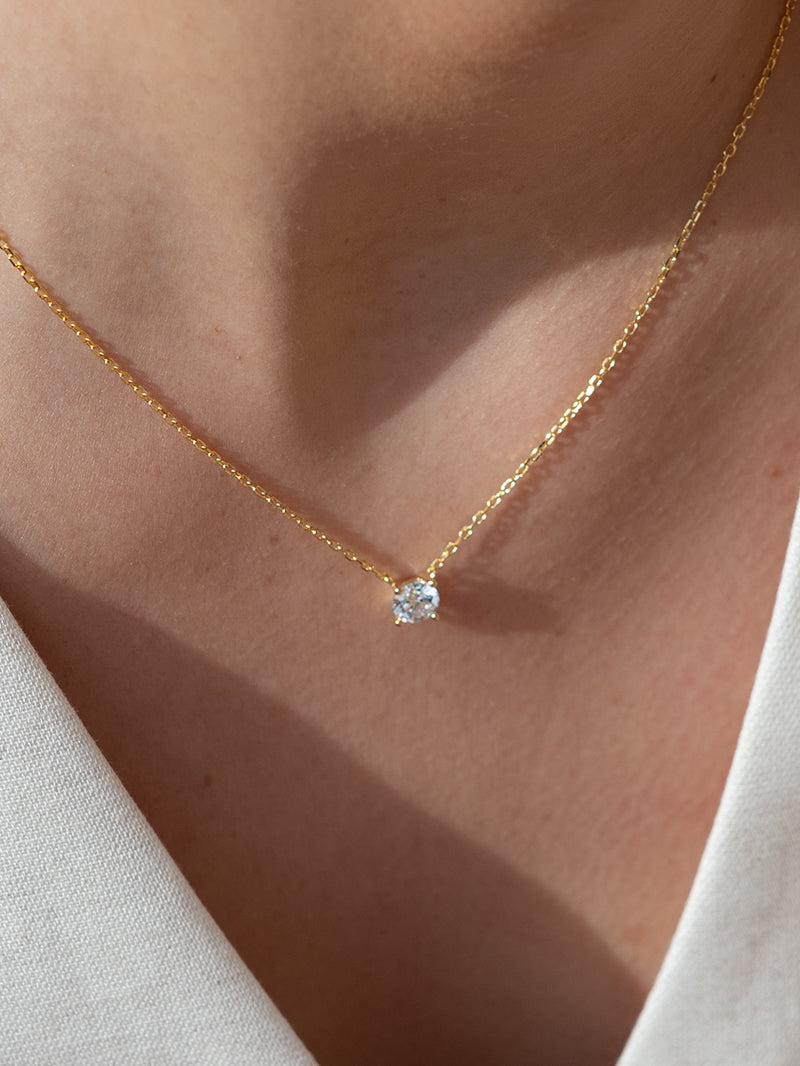 Small pendants with cubic zirconia plated in gold