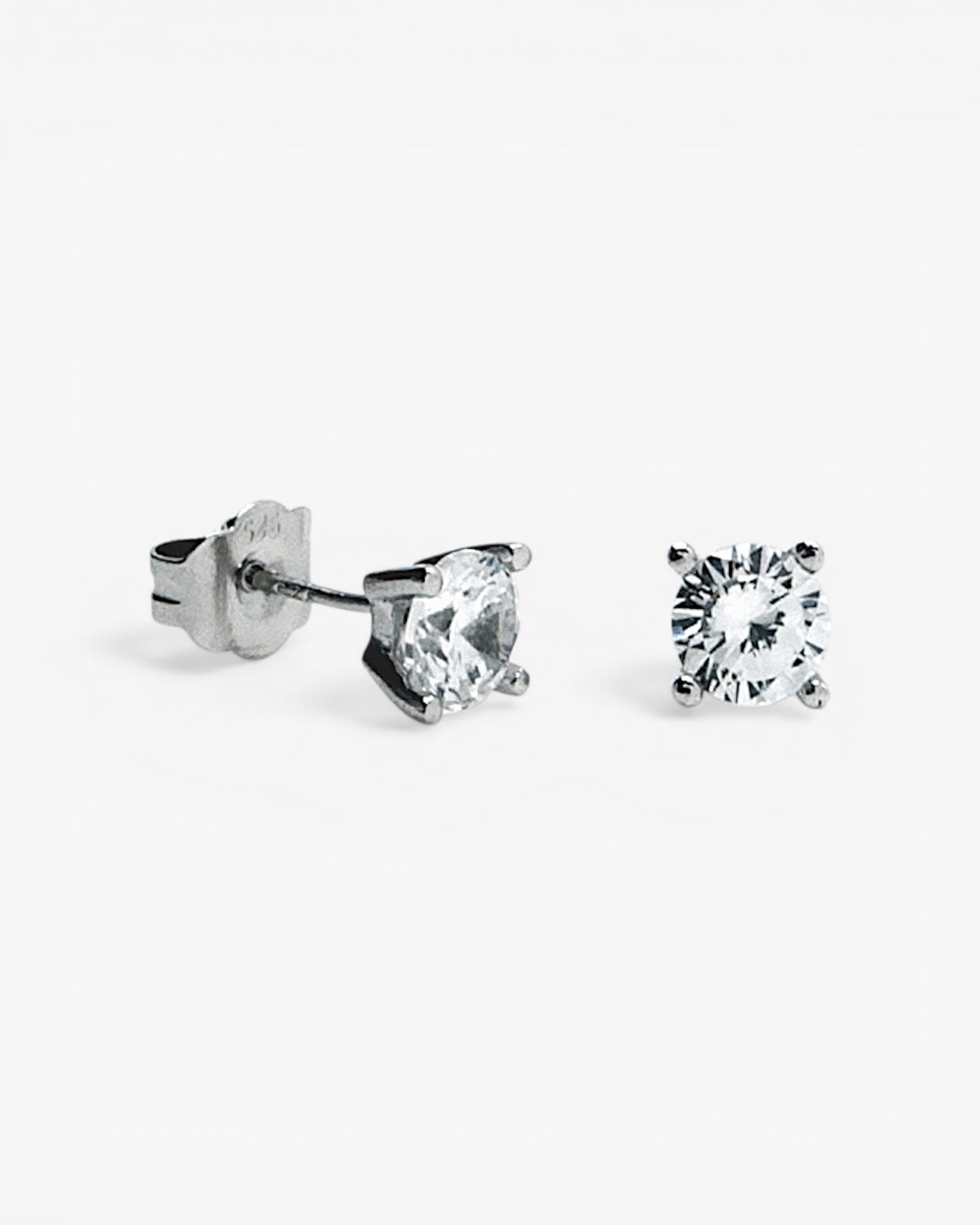 Small geometric design earrings in plain silver