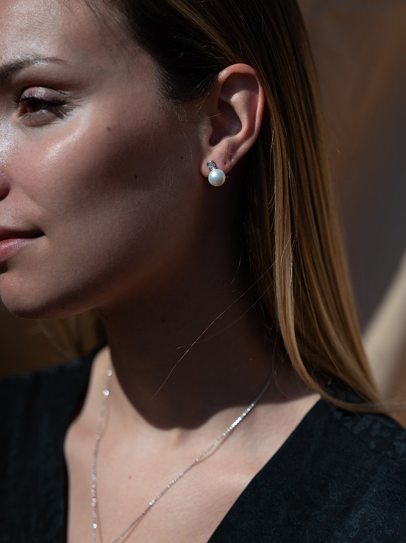 Earrings for you and me, pearl and adamantine quartz design