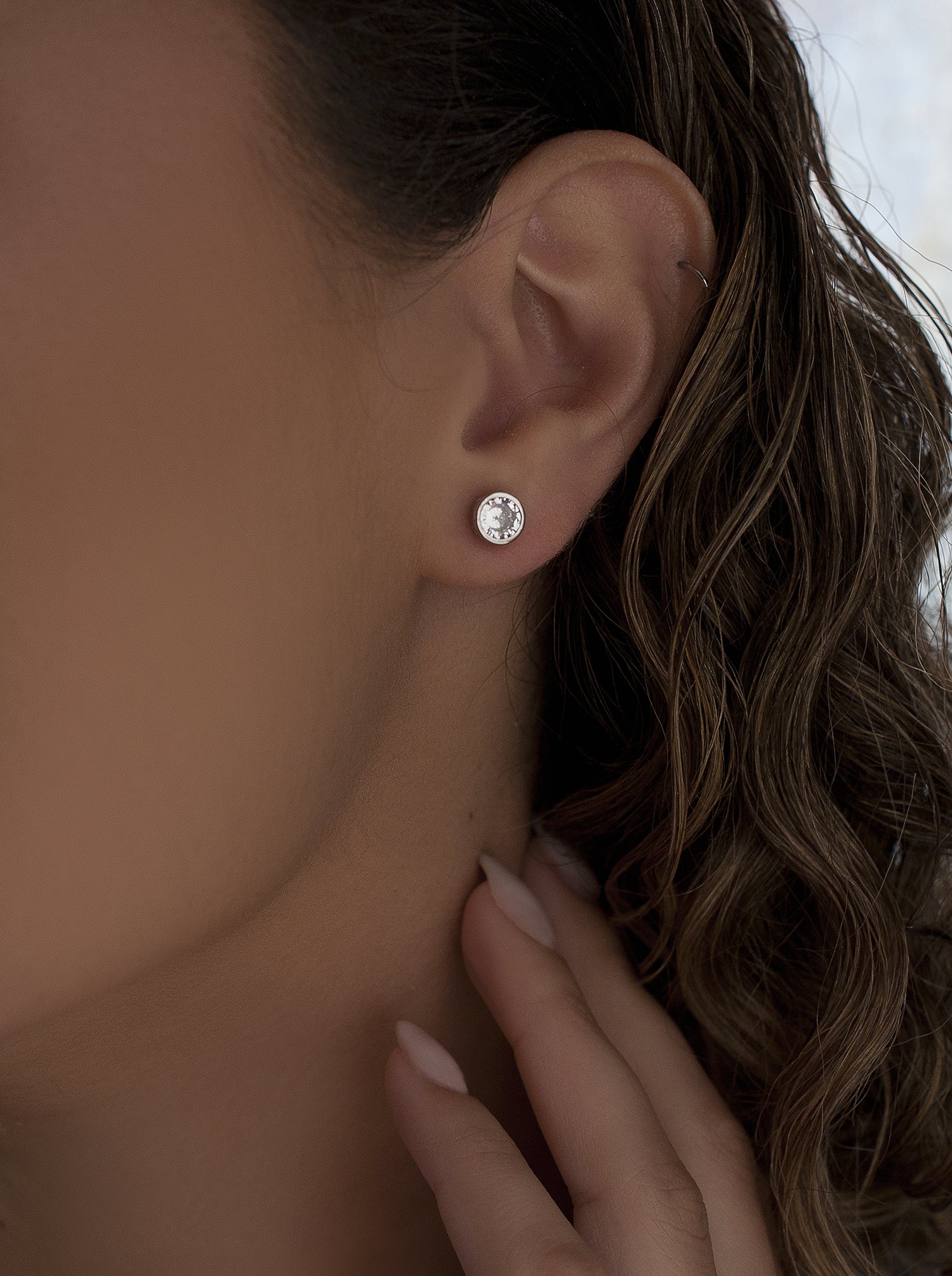 Small circular design earrings with cubic zirconia