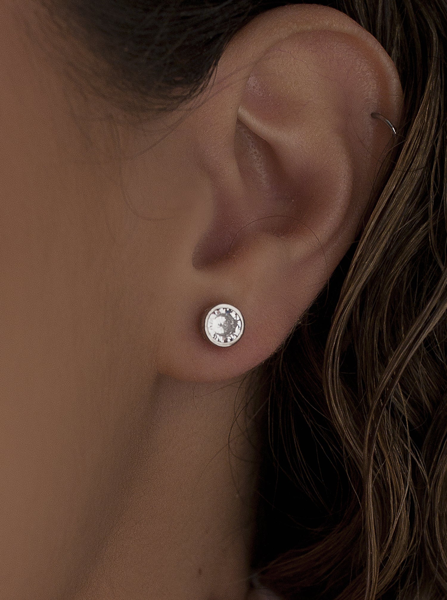 Small circular design earrings with cubic zirconia