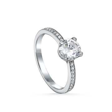 Anillo solitario de plata contorno de circonitas y cuarzo adamantino