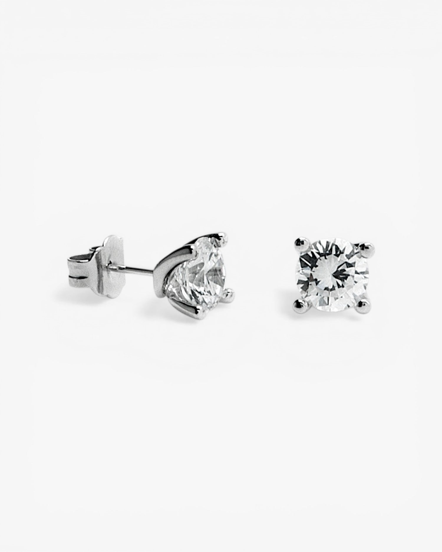 Small sparkling silver stud earrings with a stud and cubic zirconia design