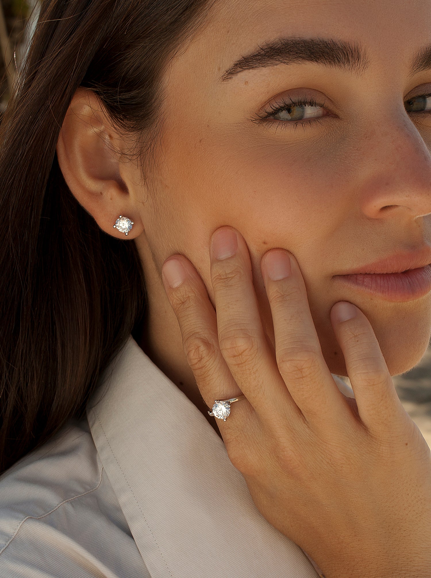 Small sparkling silver stud earrings with a stud and cubic zirconia design