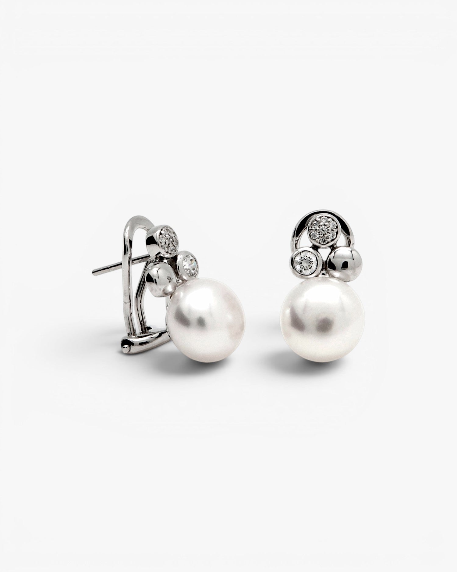 Pendientes tu y yo diseño perla detalles de circonita y plata lisa
