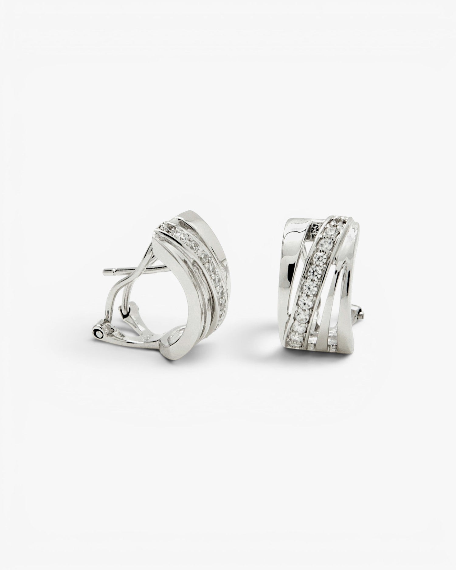 Omega clasp earrings with diagonal channel design and cubic zirconia