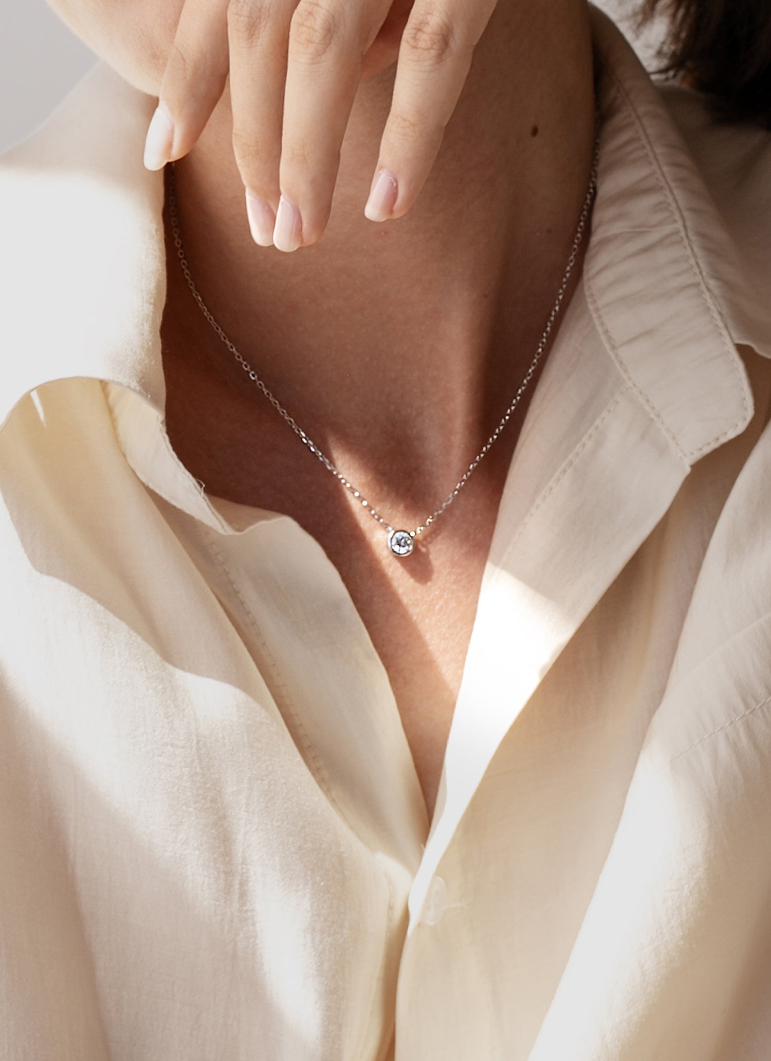 pendentifs petits design de zircon et argent lisse