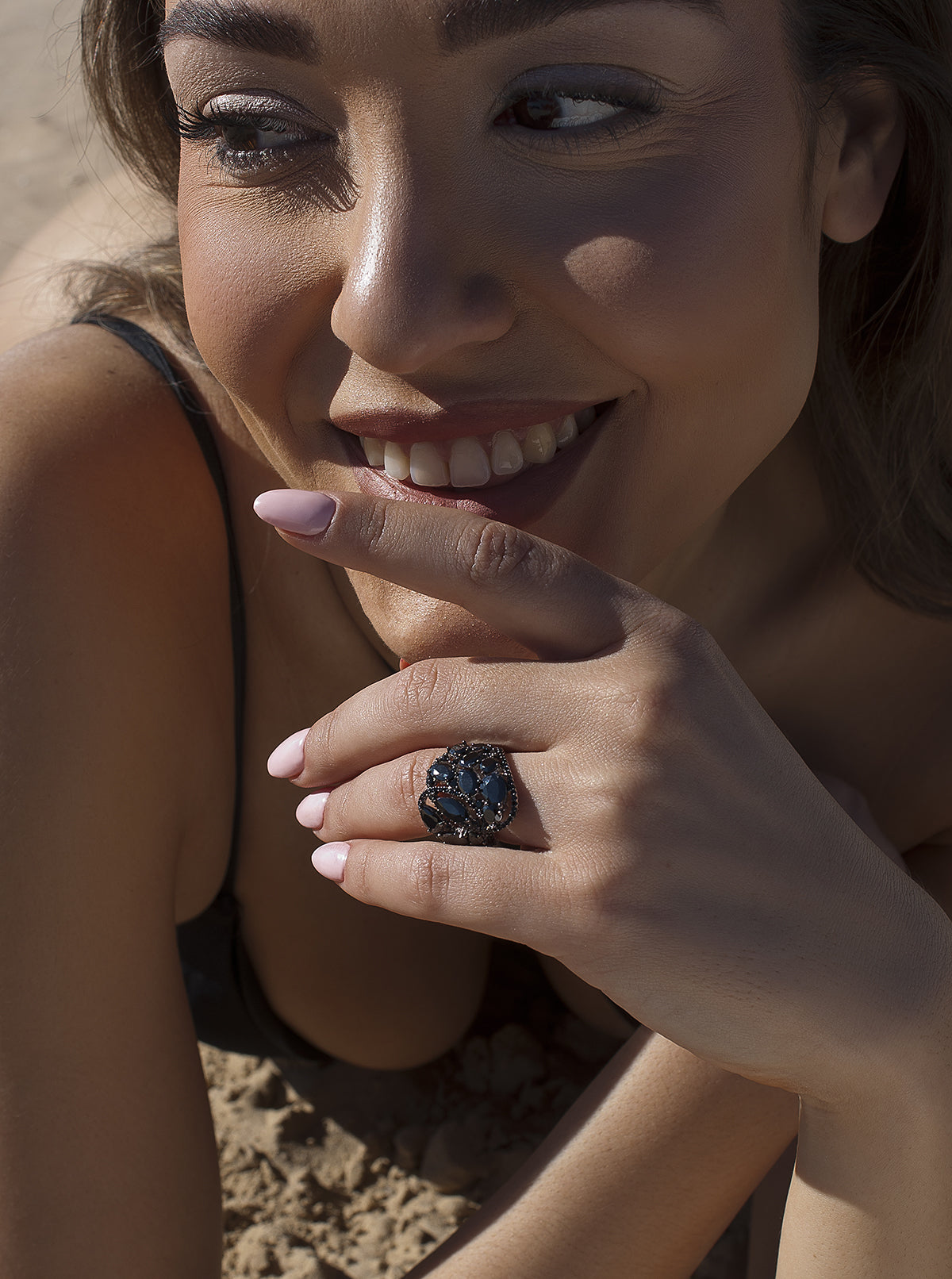 Wide rings with black cubic zirconia and floral motif