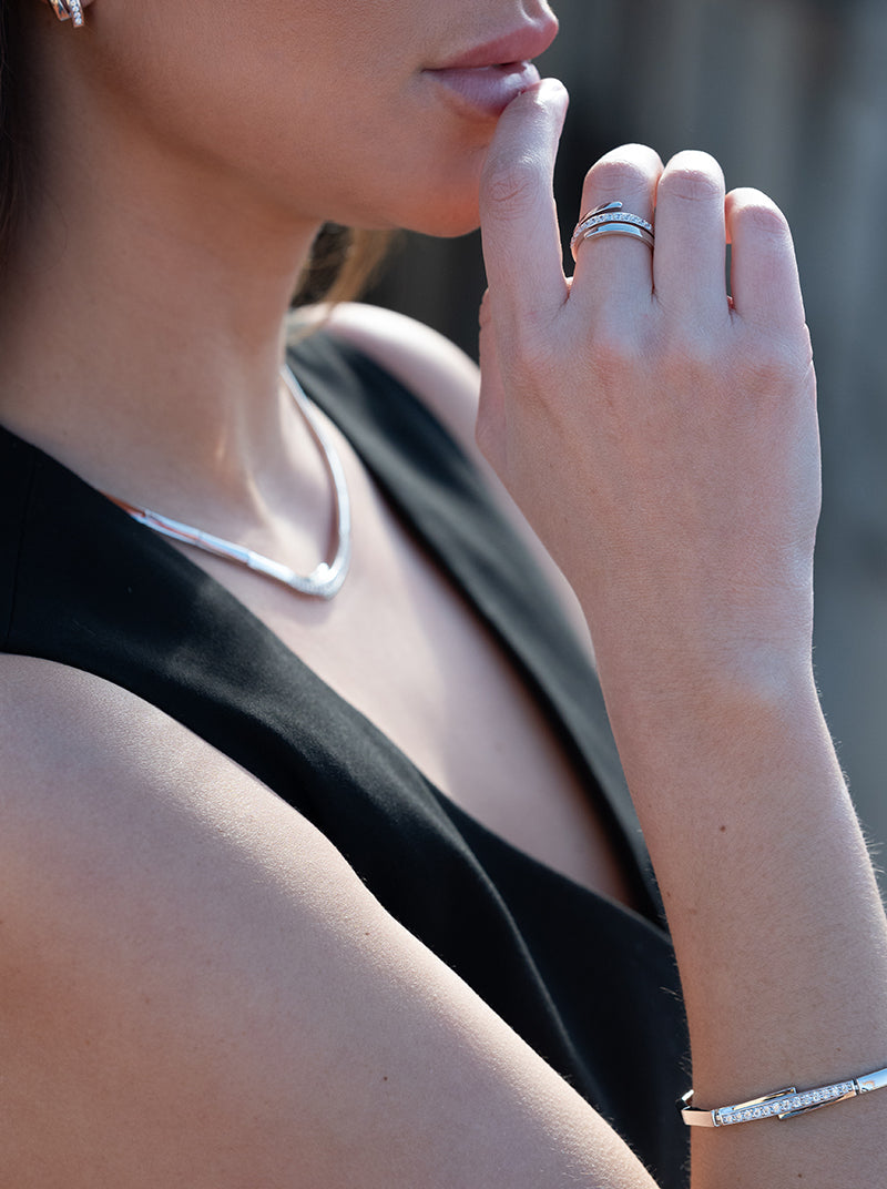 Sparkling silver bracelets with unfinished side bands and a central cubic zirconia detail