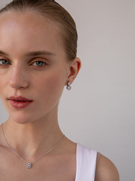 Pendientes circulares de plata diseño doble con circonitas