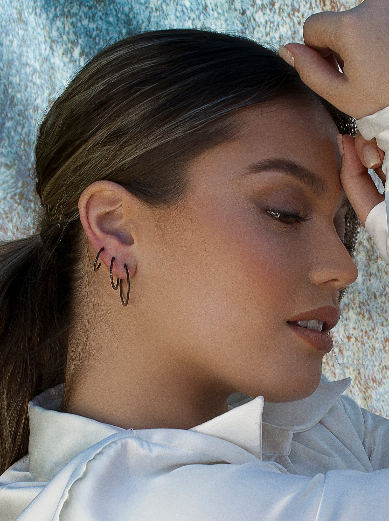 Small ruthenium-plated silver hoop earrings with black cubic zirconia