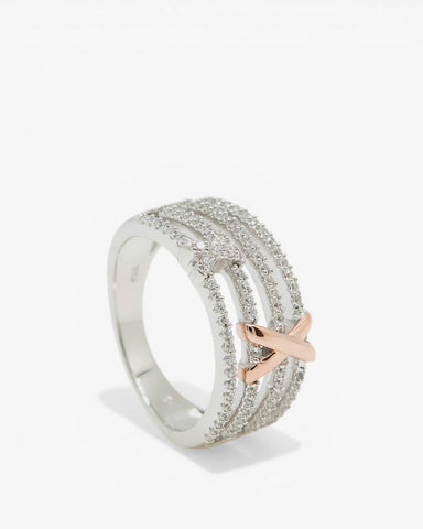 Anillos circonitas de plata con grapa cruzada
