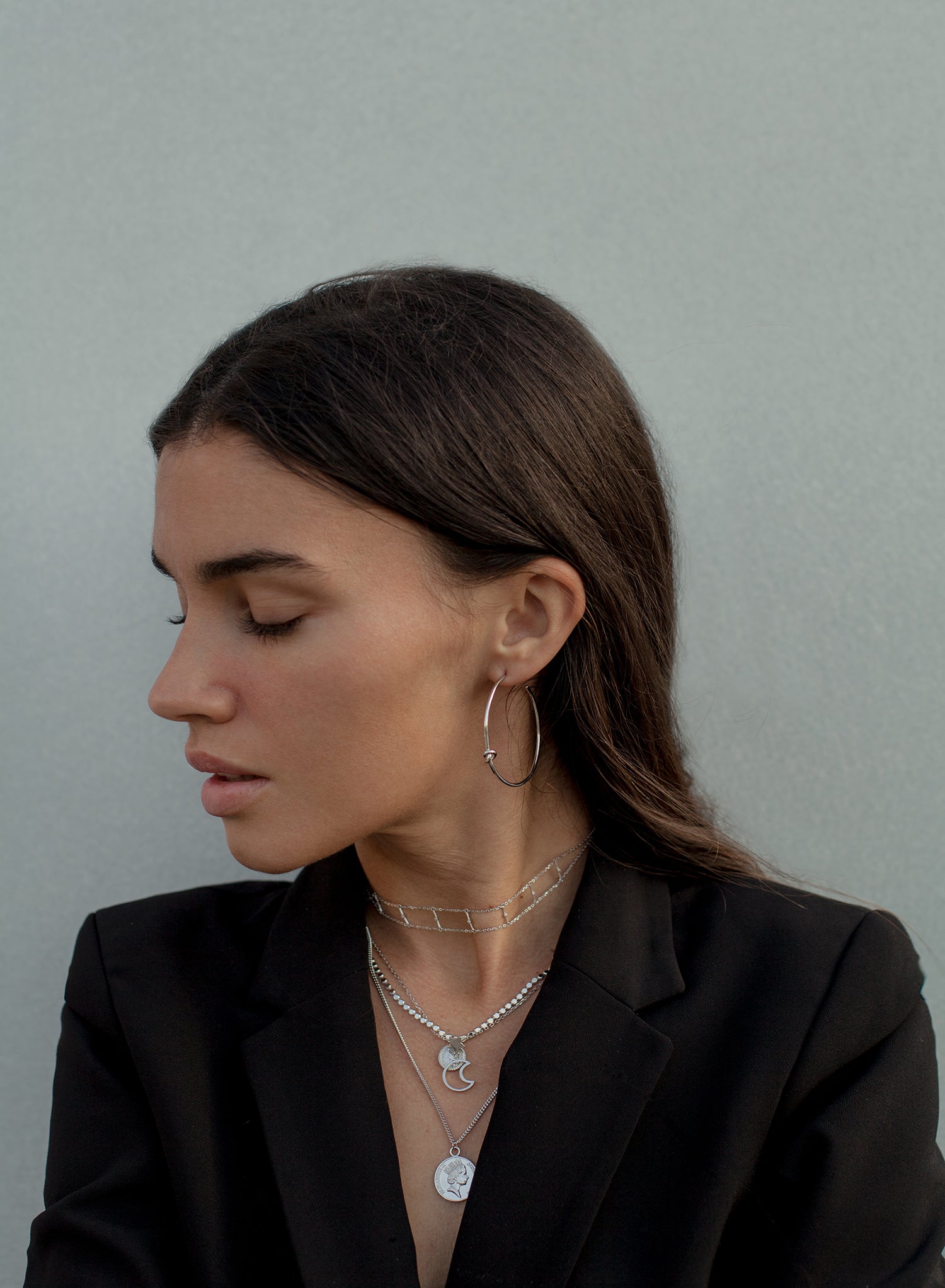 Pendientes aros grandes detalle de nudo y plata lisa