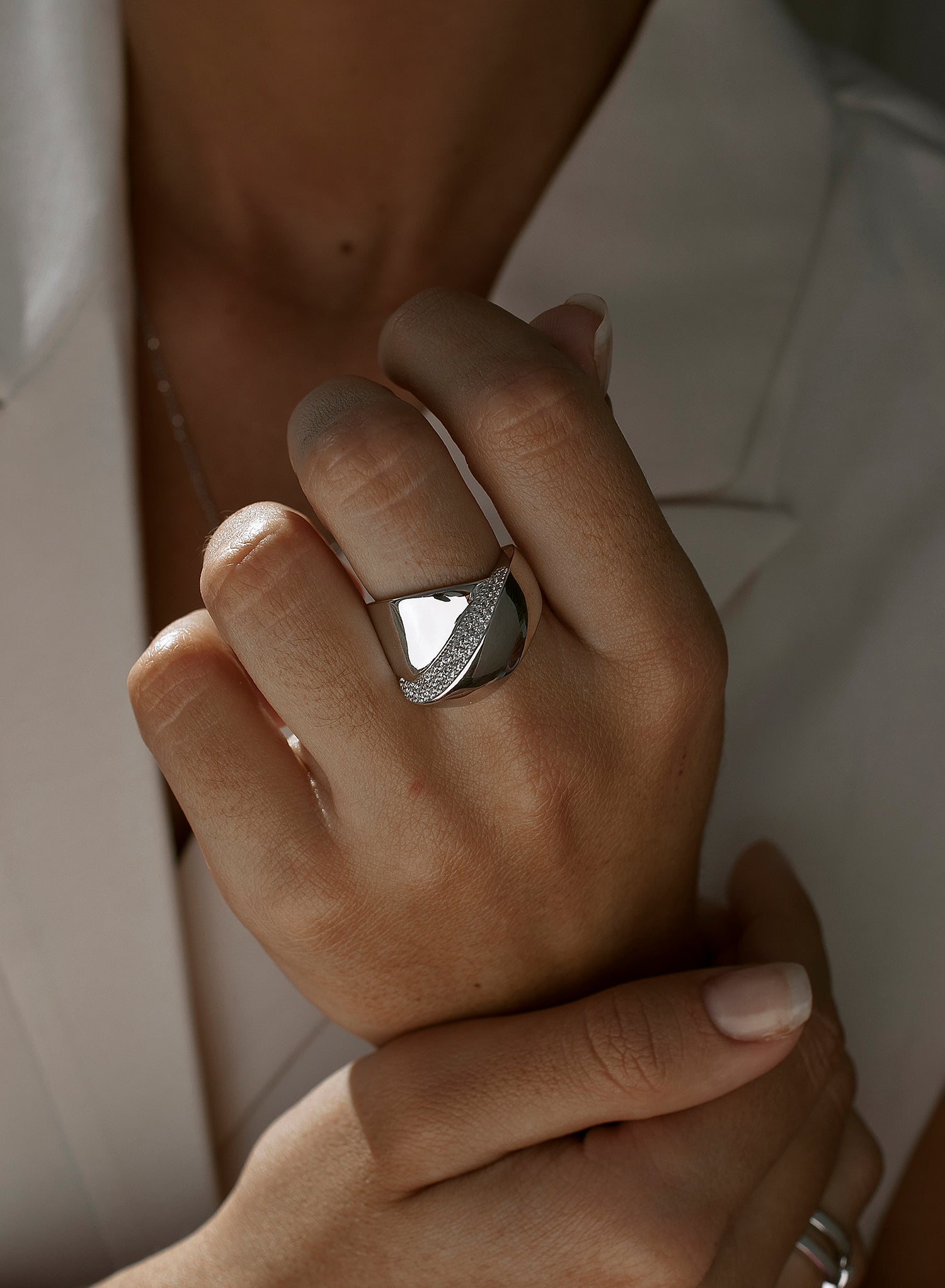 Large cross-style rings with cubic zirconia