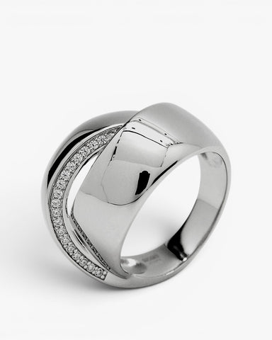 Anillos grandes diseño curvilíneo entrelazado con circonitas