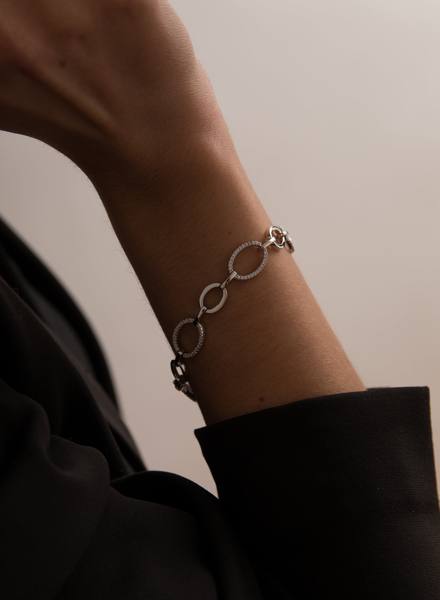 Silver link bracelet with circle design and cubic zirconia