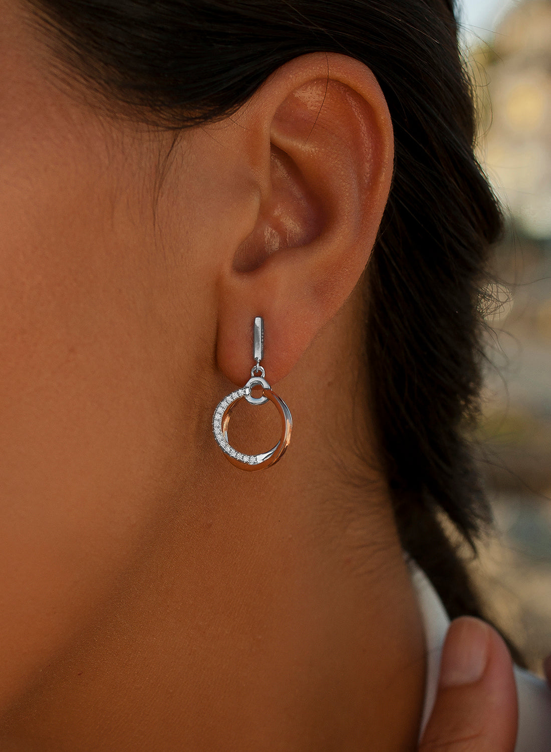 Two-tone silver and cubic zirconia dangling earrings with double hoop