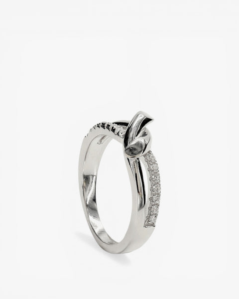 Anillos finos motivo de nudo y circonitas