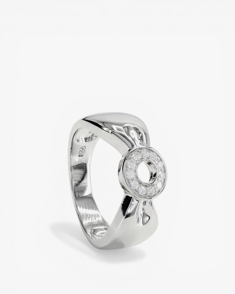 Anillo circonitas diseño de lazo con motivo circular