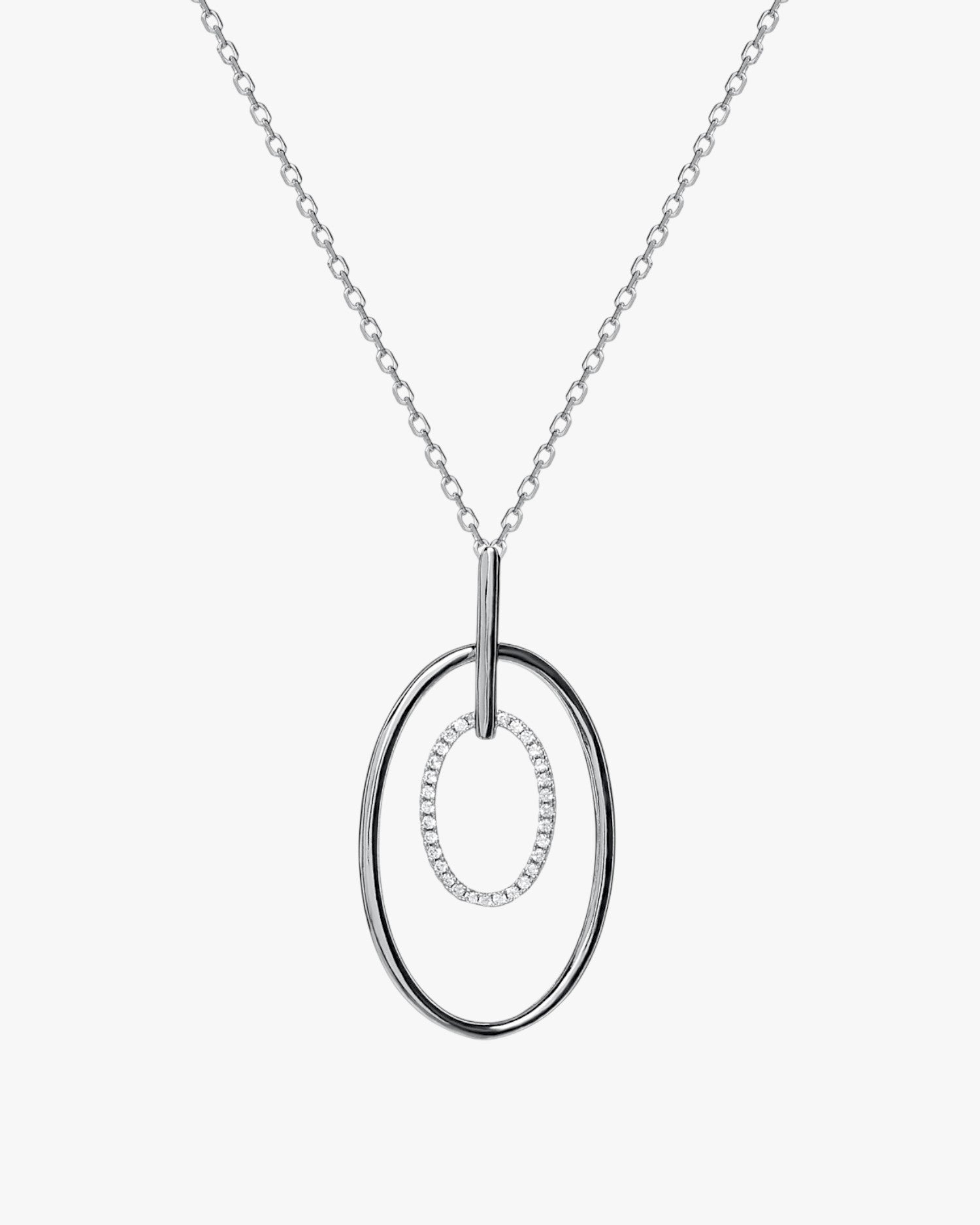 Shiny silver pendant with double circular motif