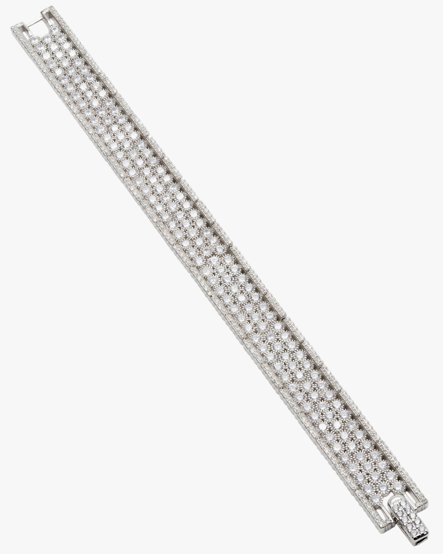 Silver riviere bracelet with multiple rails of round white adamantine quartz and cubic zirconia detail on the sides