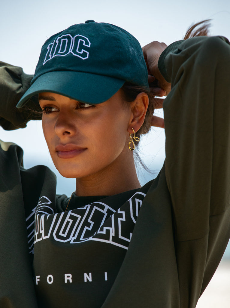 Pendientes originales en plata bañada en oro estilo liquido entrelazado