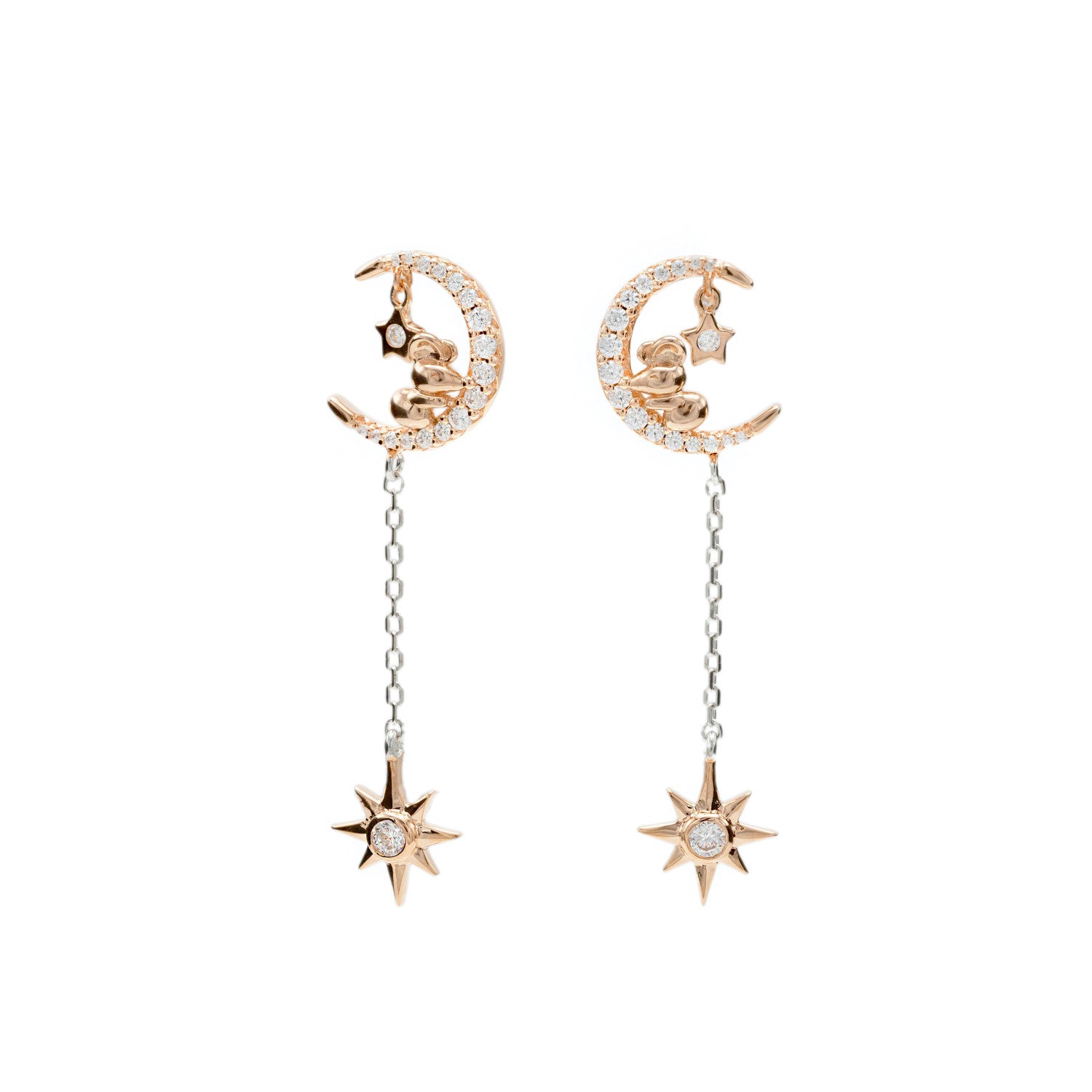 Pendientes largos brillantes compuestos por motivos de luna y estrella