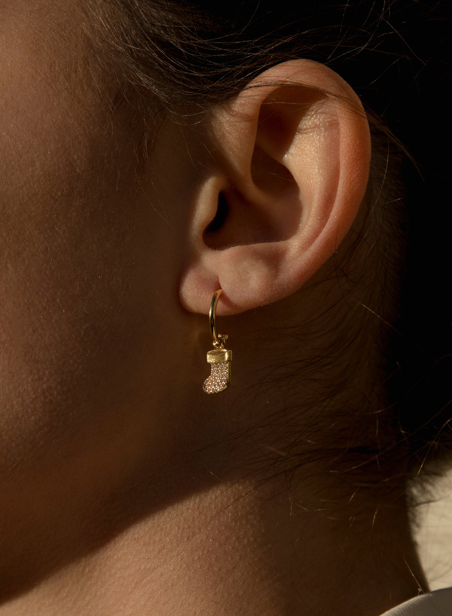 Hoop earrings with pendants and Christmas-themed charms